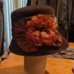 Elegant Brown Hat with Floral Accent